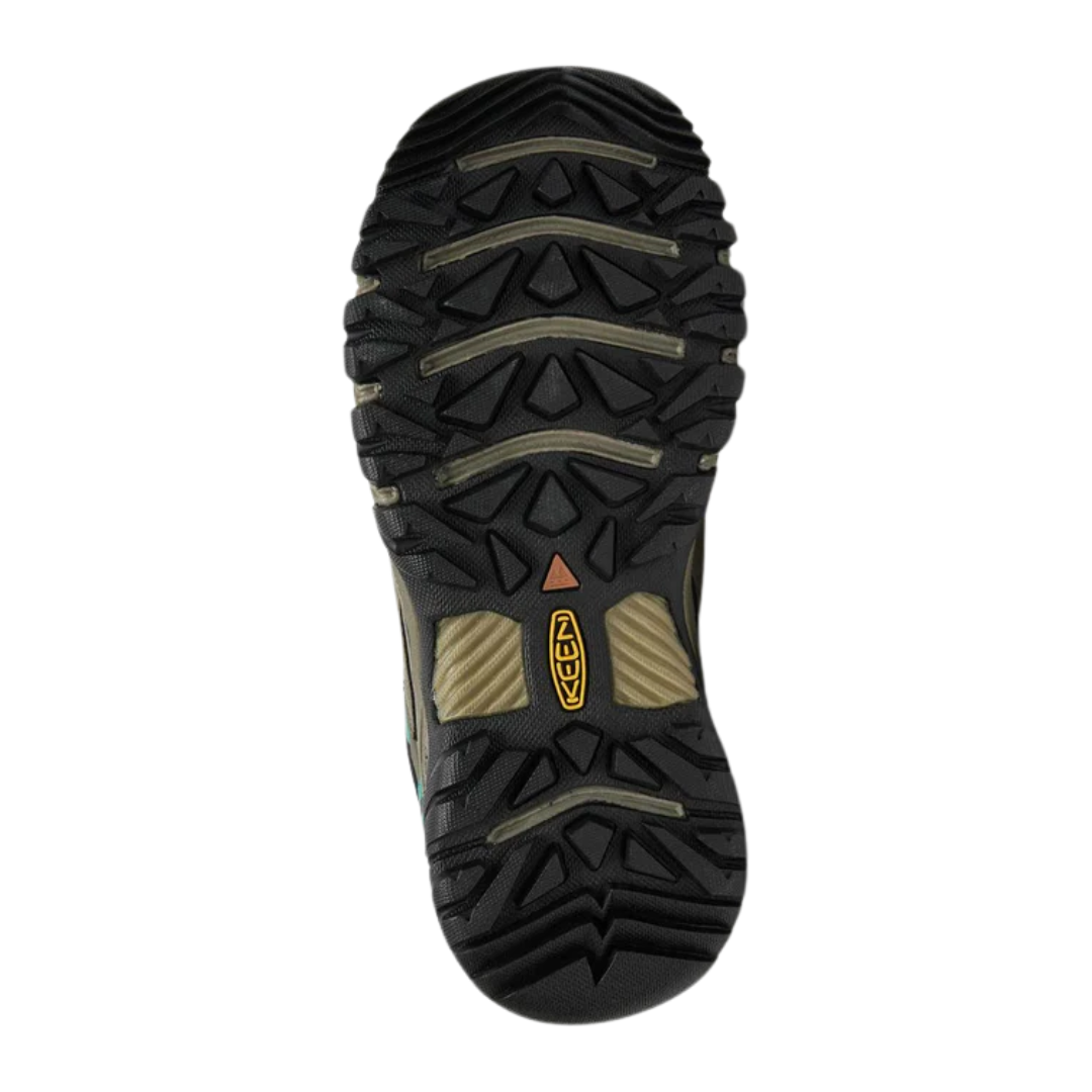 Bottom view of Women’s Targhee III Low hiking shoe in toasted coconut and porcelain – featuring a rugged rubber outsole with multi-directional lugs for reliable traction on varied terrain, flex grooves for natural foot movement, and non-marking design for versatile use.