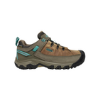 Side view of Women’s Targhee III Low hiking shoe in toasted coconut and porcelain – featuring a durable nubuck leather and mesh upper for breathability, cushioned midsole for all-day comfort, and reinforced toe and heel overlays for protection.