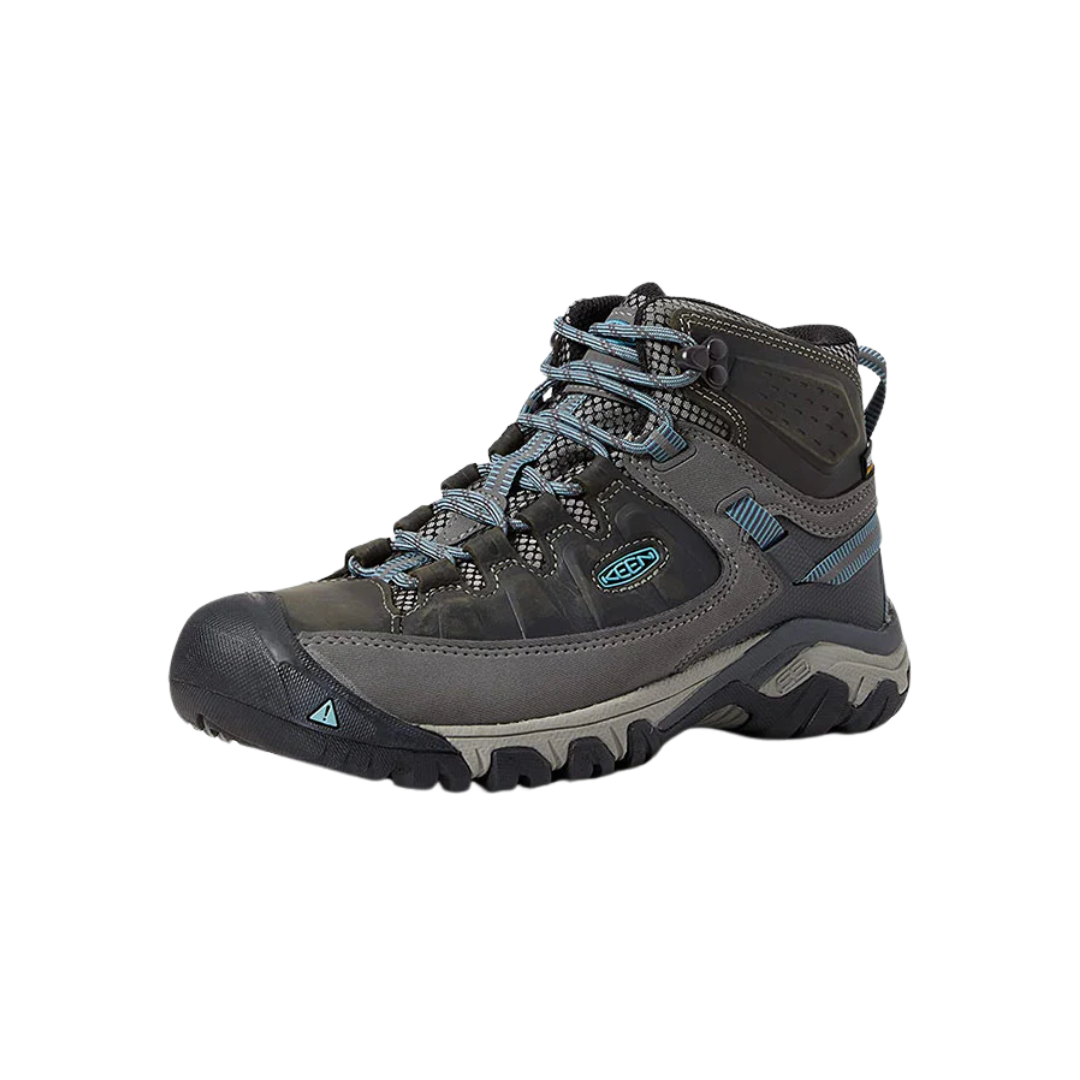 Side view of Women’s Targhee III Mid Boot in magnet and atlantic blue – featuring a waterproof nubuck leather upper with breathable mesh panels, cushioned midsole for all-day hiking comfort, and reinforced toe and heel overlays for durability.