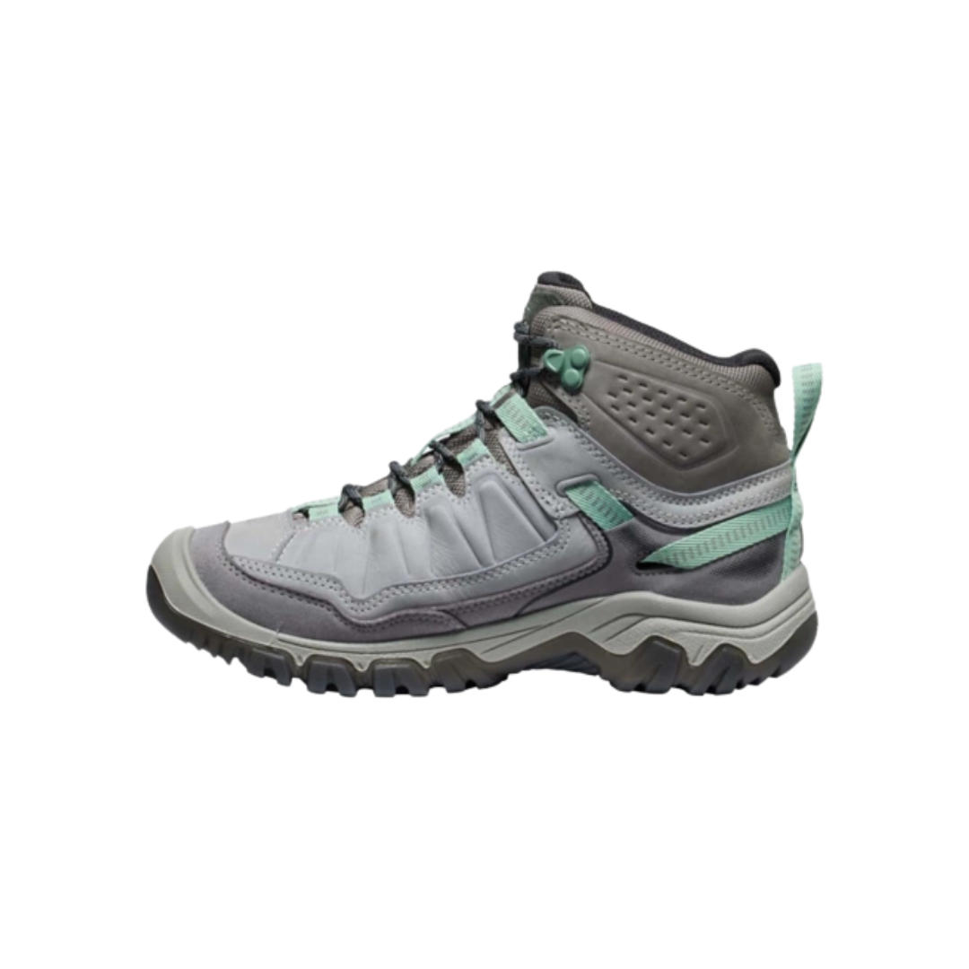 Side view of Women’s Targhee IV Mid WP hiking boot in alloy and granite green – featuring a waterproof nubuck leather upper with breathable mesh panels, cushioned midsole for all-day comfort, and reinforced toe and heel overlays for durability.