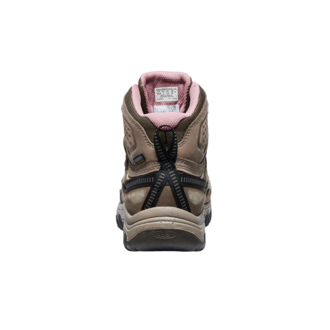 Back view of Women’s Targhee IV Mid WP hiking boot in brindle and nostalgia rose – featuring a molded heel counter for rearfoot stability, pull tab for easy on and off, and reflective accents for enhanced low-light visibility.