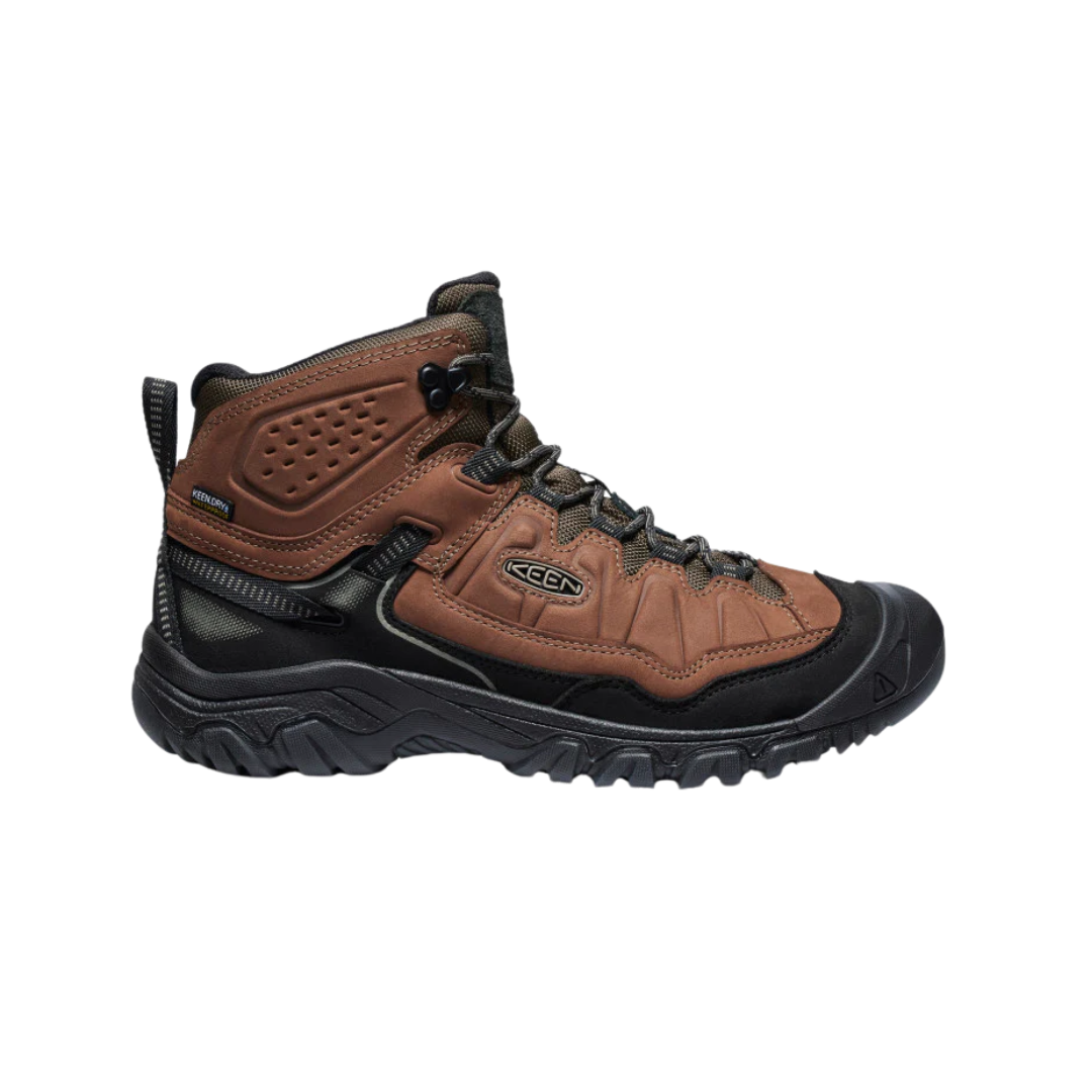Side view of Men’s Targhee IV Mid Waterproof Boot in bison and black – featuring a waterproof nubuck leather upper with breathable mesh panels, cushioned midsole for all-day comfort, and reinforced toe and heel overlays for durability.