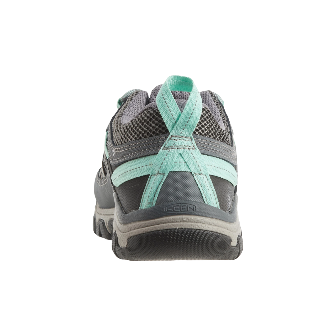 Back view of Women’s Targhee Vent hiking shoe in steel grey and ocean wave – featuring a molded heel counter for rearfoot stability, pull tab for easy on and off, and reflective accents for visibility in low-light conditions.