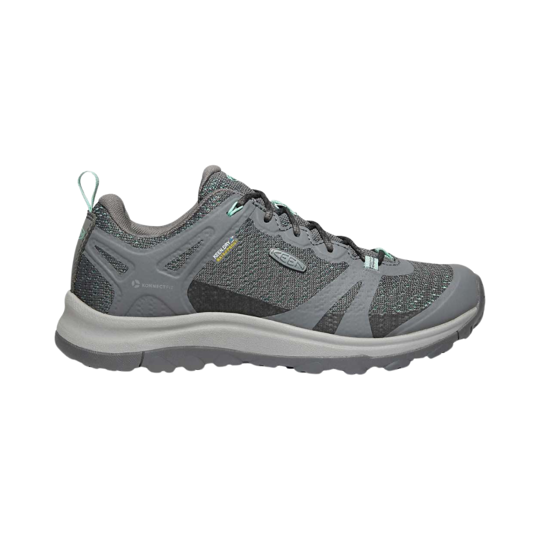 Side view of Women’s Terradora II Low Waterproof hiking shoe in steel grey and ocean wave – featuring a waterproof nubuck leather and mesh upper, cushioned midsole with shock-absorbing properties to reduce joint impact, and reinforced toe and heel overlays for durability.