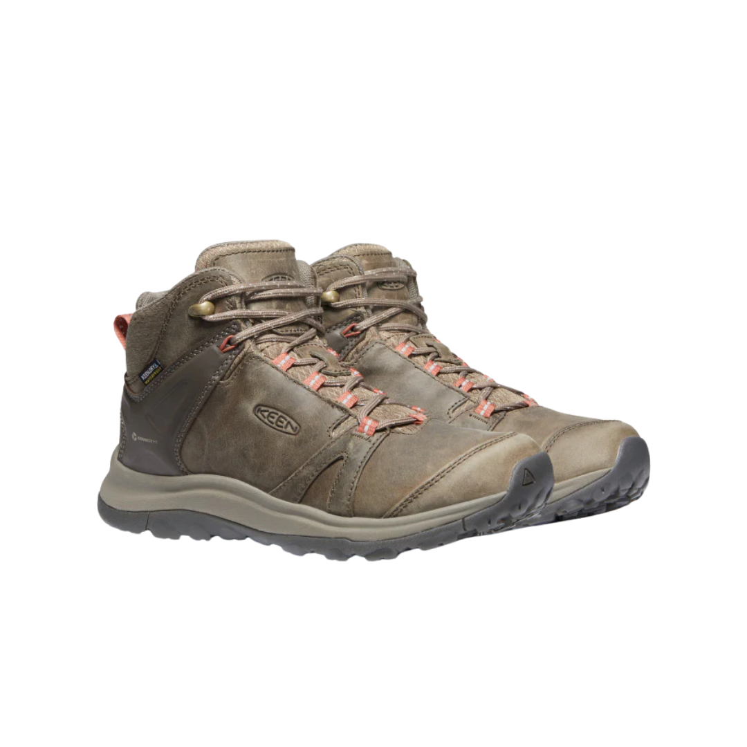 Side view of Women’s Terradora II Mid Waterproof Boot in brindle and redwood – featuring a waterproof nubuck leather upper with breathable mesh panels, cushioned midsole for all-day comfort, and reinforced toe and heel overlays for durability.