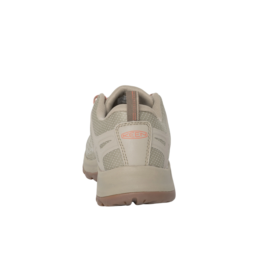 Back view of Women’s Terradora II Vent hiking shoe in plaza taupe and coral – featuring molded heel counter for rearfoot stability, pull tab for easy on and off, and reflective accents for enhanced visibility during low-light conditions.