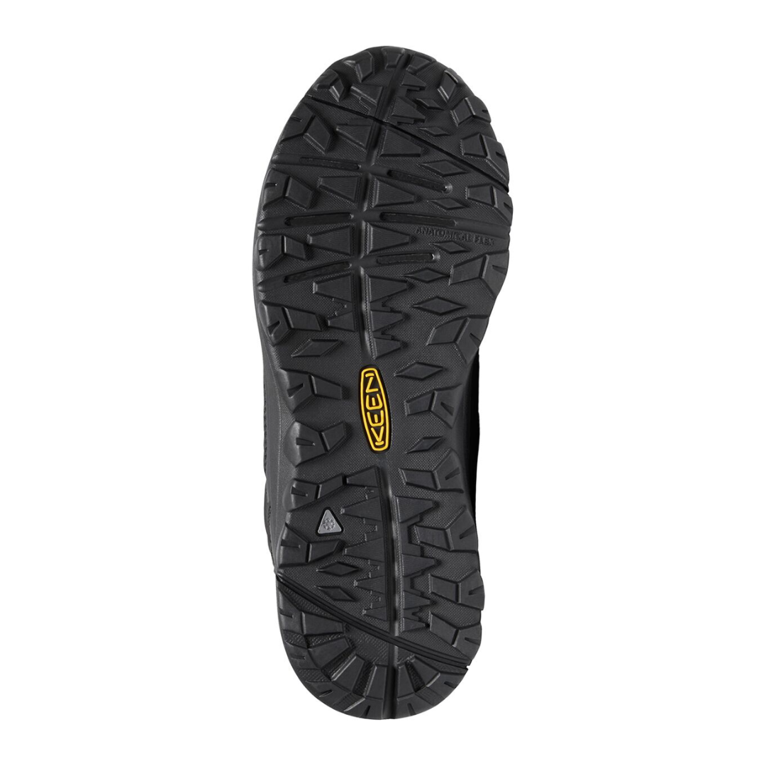 Bottom view of Women’s Terradora II Wintry Waterproof Boot in black – featuring a rugged rubber outsole with multi-directional lugs and micro-glass fiber lugs for icy traction, flex grooves for natural foot movement, and slip-resistant tread to prevent falls.