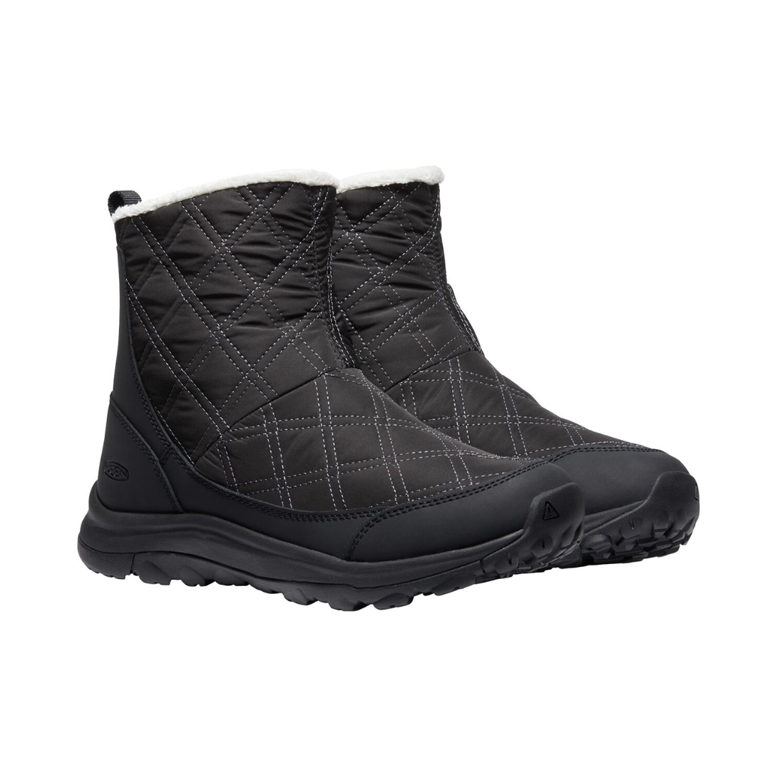 Side view of Women’s Terradora II Wintry Waterproof Boot in black – featuring a waterproof nubuck leather upper with insulated lining for warmth in cold conditions, cushioned midsole with shock absorption to reduce joint stress, and reinforced toe and heel overlays for durability.