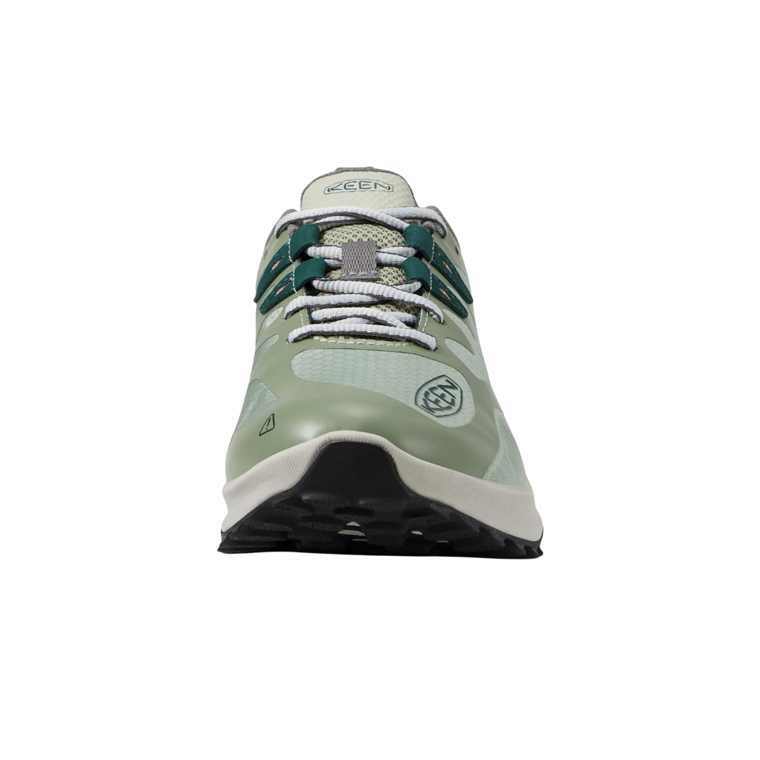 Front view of Keen Women's Zionic Waterproof Hiking Shoe in Desert Sage/Ember Glow – featuring a reinforced rubber toe, secure lacing system, and durable waterproof construction engineered to protect against trail debris and light moisture.