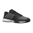 Side view of Men’s K-Swiss Hypercourt Express 2 in Black/White/Highrise – showcasing breathable mesh construction with synthetic support layers, a cushioned Surgelite midsole, and signature 5-stripe branding for athletic versatility.