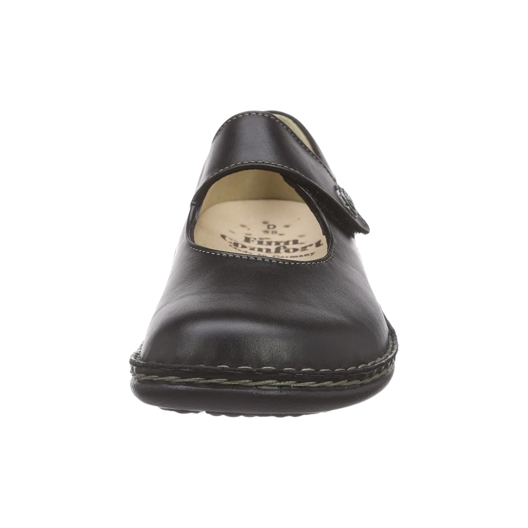 Front  View of Women’s Finn Comfort Laval Mary Jane shoe in Black Nappaseda leather – featuring a single adjustable hook-and-loop strap with a decorative metal medallion, a contoured removable cork footbed, and a roomy toe box for all-day comfort.