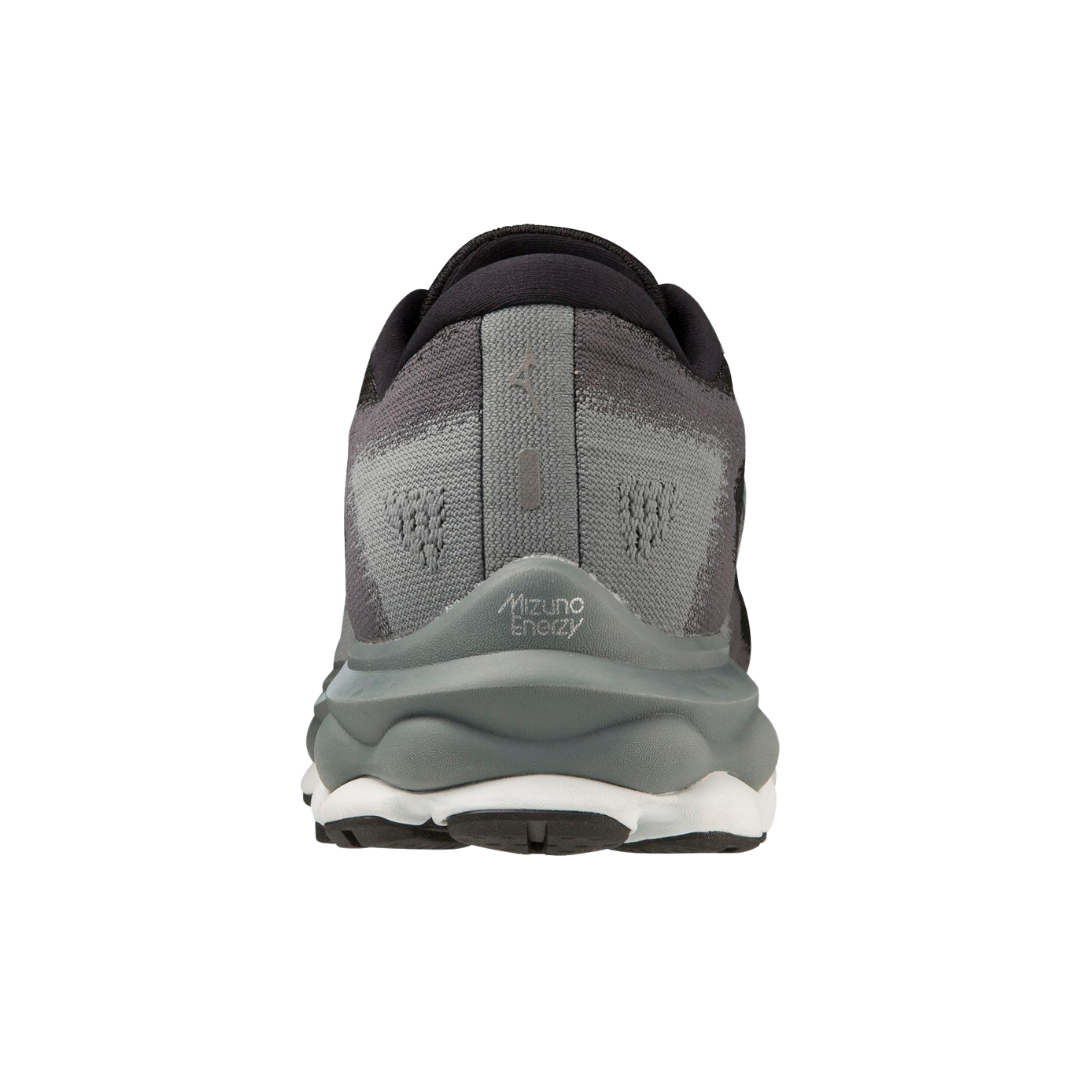 Back view of Men’s Wave Sky 7 running shoe in black and glacier ridge – featuring a molded heel counter, Achilles-friendly collar shape, and reflective logo for nighttime visibility.