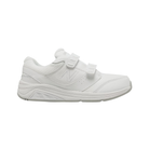 Side view of Women’s New Balance 928v3 hook and loop velcro strap athletic shoe in all white – featuring breathable white mesh and synthetic upper, supportive cushioned midsole for comfort during all-day wear, hook and loop straps for adjustable fit, and durable outsole engineered for traction and stability.