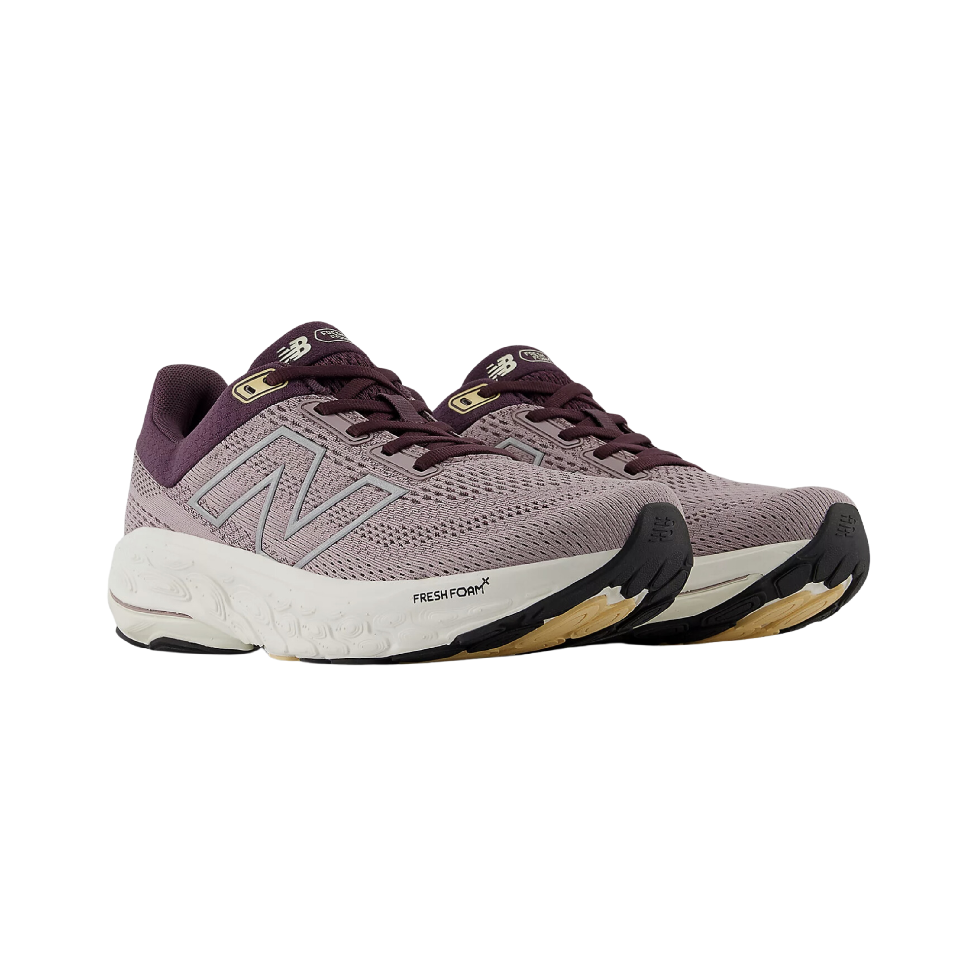 Side view of Women’s New Balance Fresh Foam x 860v14 athletic shoe in purple and white – featuring lightweight knit upper, Fresh Foam cushioning for comfort, durable rubber outsole, and sleek modern design.