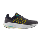 Side view of Men’s New Balance Fresh Foam x 860v14 athletic shoe in grey, yellow, and white – featuring a breathable engineered mesh upper, Fresh Foam midsole for soft, responsive cushioning, secure lace-up closure, and a rubber outsole designed for durability and traction.