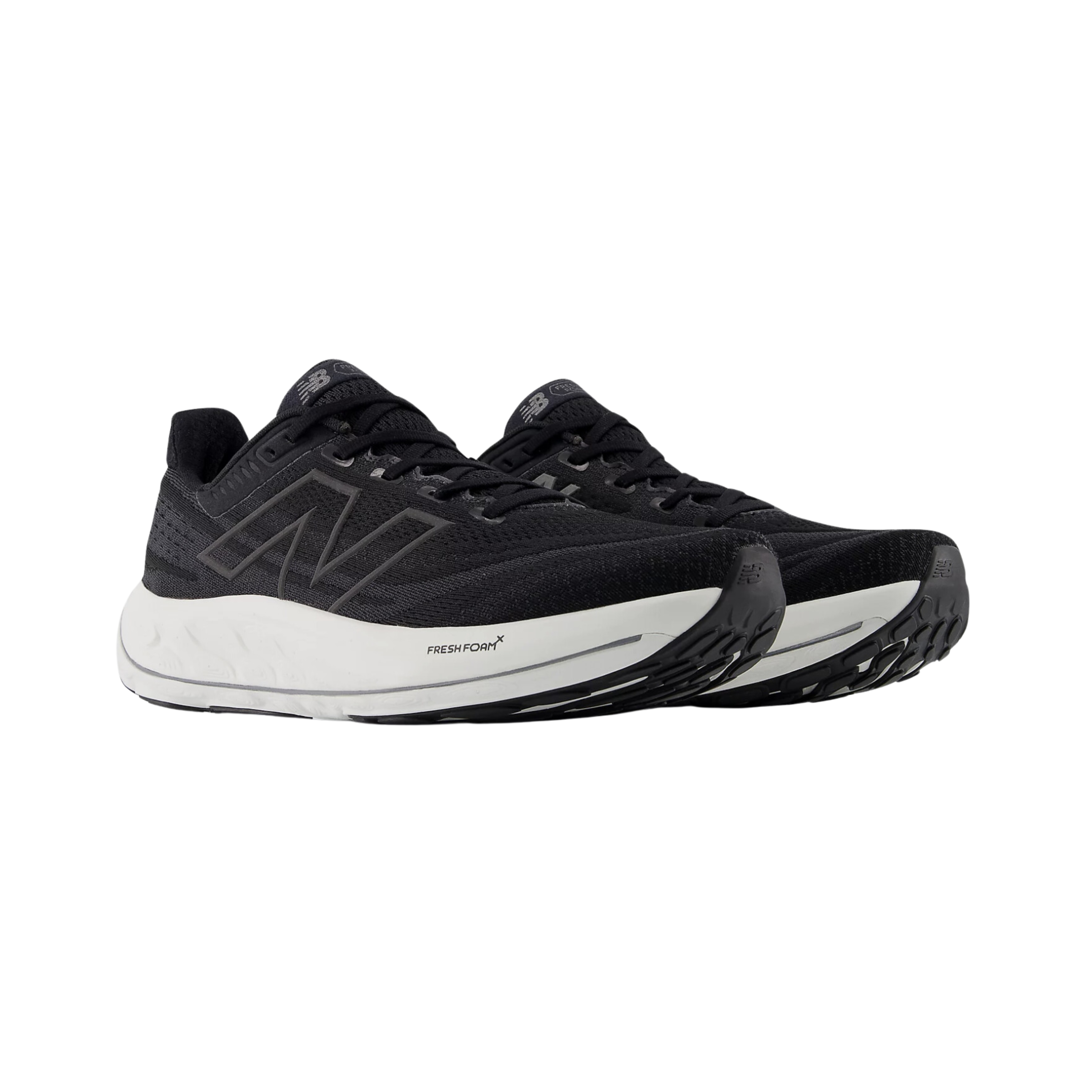 Side view of Men’s New Balance Fresh Foam x Vongo v6 athletic shoe in black and white – featuring Fresh Foam cushioning, supportive upper, durable outsole, and stability features.