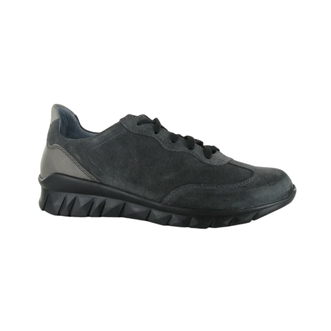 Side View of Women’s Naot Infinity sandal in midnight and foggy gray – featuring a premium leather strappy upper, a cushioned cork and latex footbed for arch support, and a lightweight flexible sole for everyday comfort.