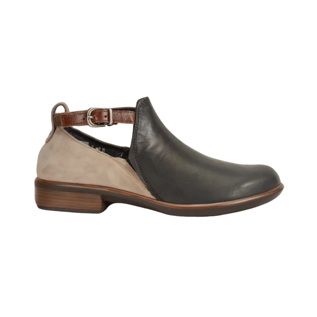 Side View of Women’s Naot Kasmin boot in black, raven, stone, and luggage brown – featuring a multi-tone leather upper, a cushioned and contoured cork and latex footbed, and a durable slip-resistant outsole for everyday comfort.