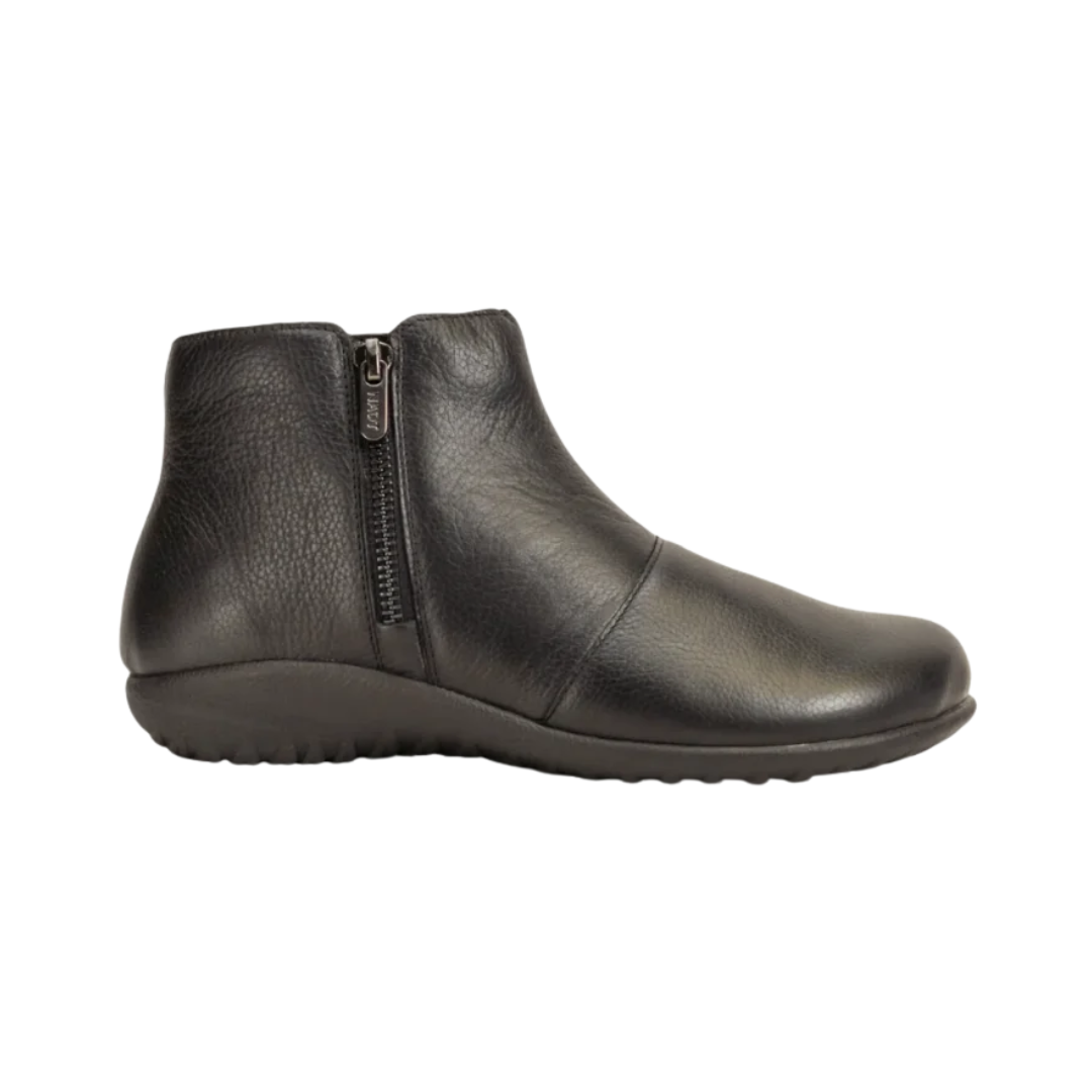 Side View of Women’s Naot Wanaka boot in black leather – featuring a smooth leather upper, a cushioned and contoured cork and latex footbed, and a durable slip-resistant rubber outsole for all-day support.