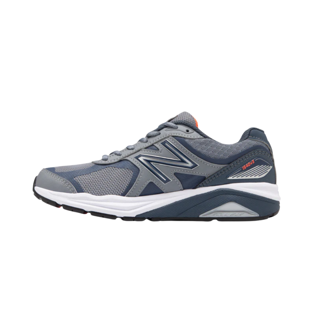 Side View of Women’s New Balance 1540v3 walking shoe in gunmetal with dragonfly – featuring ENCAP midsole cushioning for support, supportive overlays, and mesh panels for ventilation.