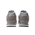 Back View of Men’s New Balance 574 casual sneaker in core grey with white – featuring sturdy heel counter, pull tab for easy wear, and branded heel patch.