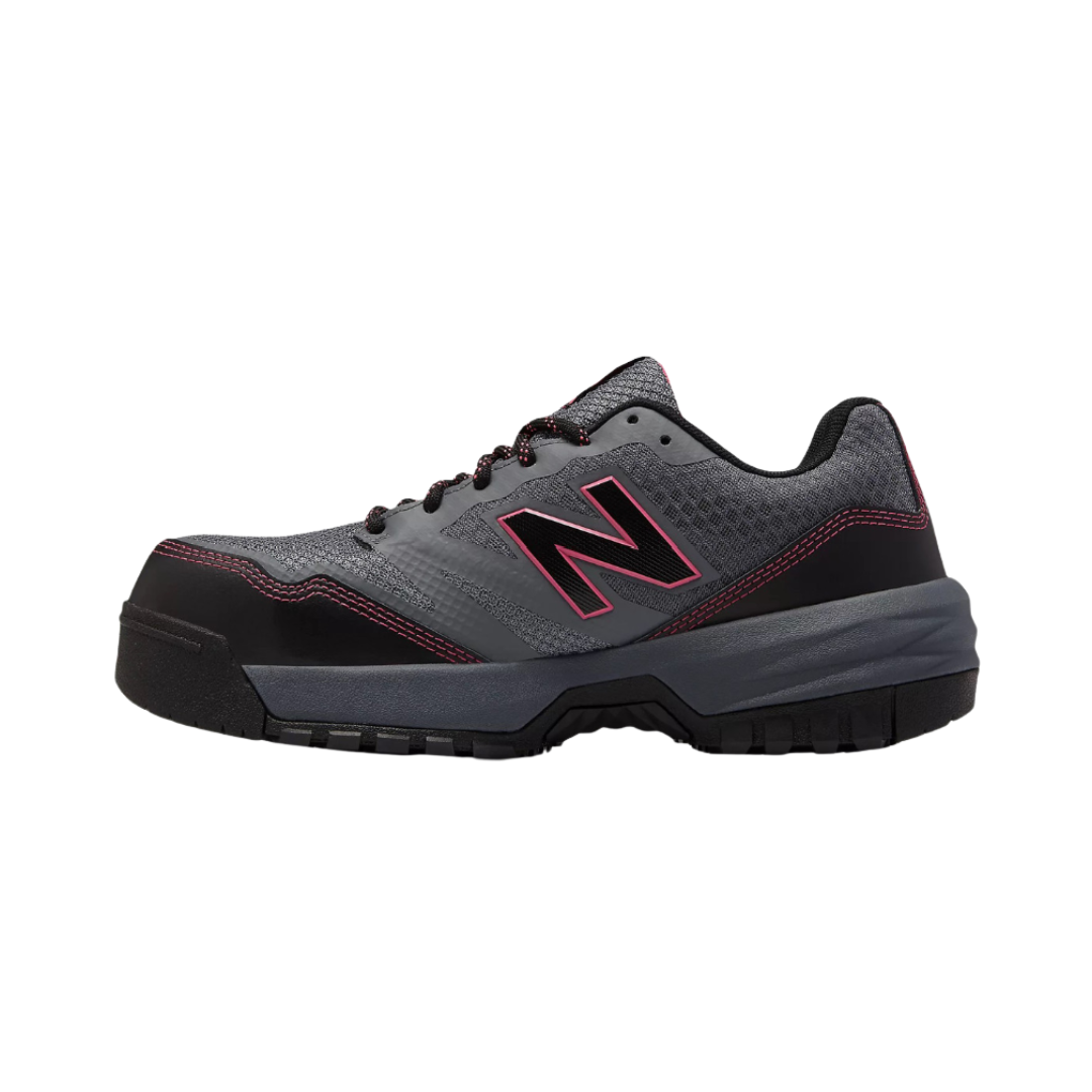 Side View of Women’s New Balance 589v1 Composite Toe Shoe in Grey with Pink – featuring durable mesh and leather upper for breathability and support, composite toe for protection, and cushioned midsole for comfort.