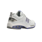 Angled View of Women’s New Balance 806 running shoe in white – featuring ABZORB midsole cushioning for impact absorption, synthetic overlays for added durability and support, and breathable mesh panels to keep feet cool.