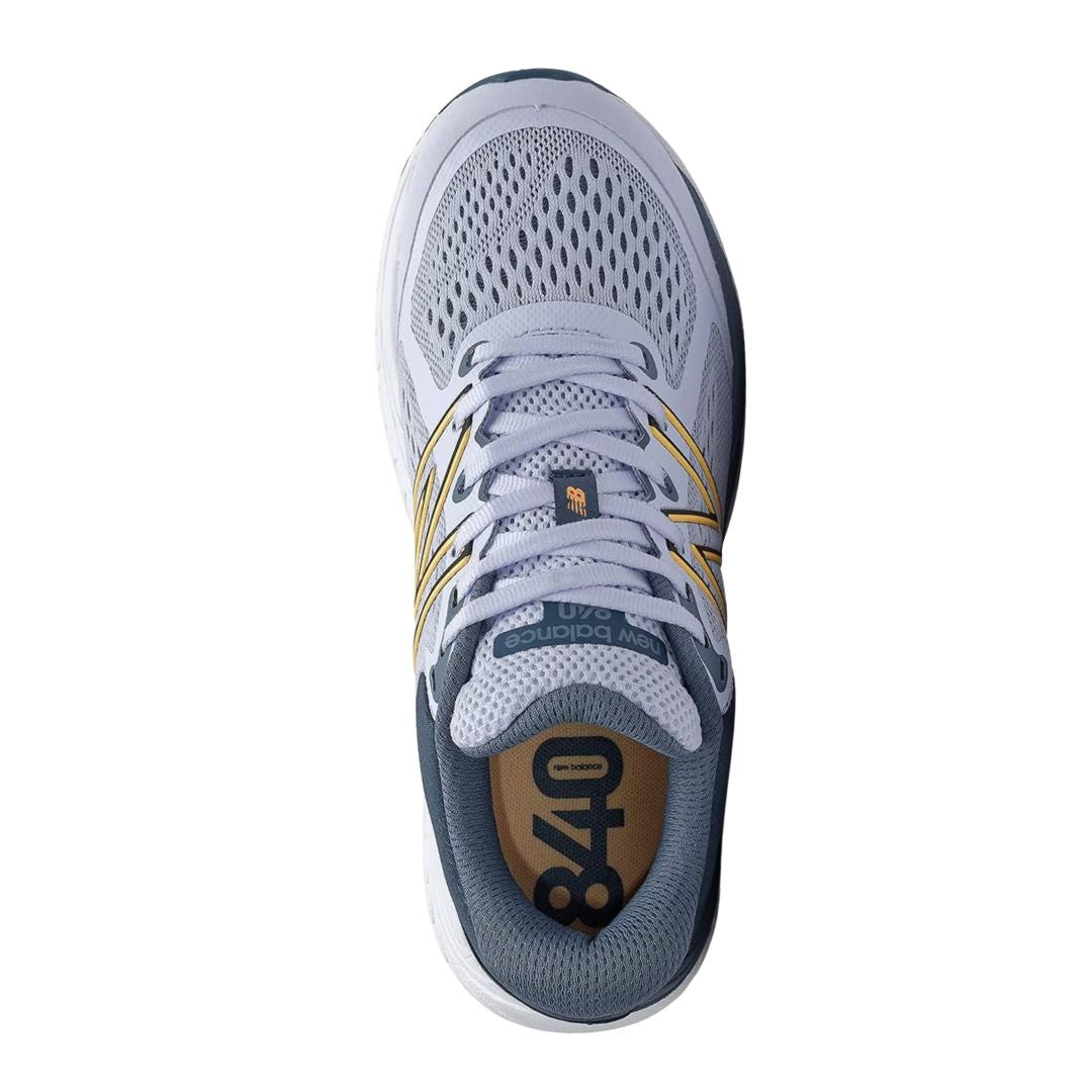 Top View of Women’s New Balance 840v5 running shoe in silent grey with light mango – featuring engineered mesh upper, padded tongue, and breathable interior lining.
