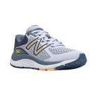 Side View of Women’s New Balance 840v5 running shoe in silent grey with light mango – featuring ABZORB midsole cushioning, no-sew overlays for lightweight support, and responsive platform for neutral runners.