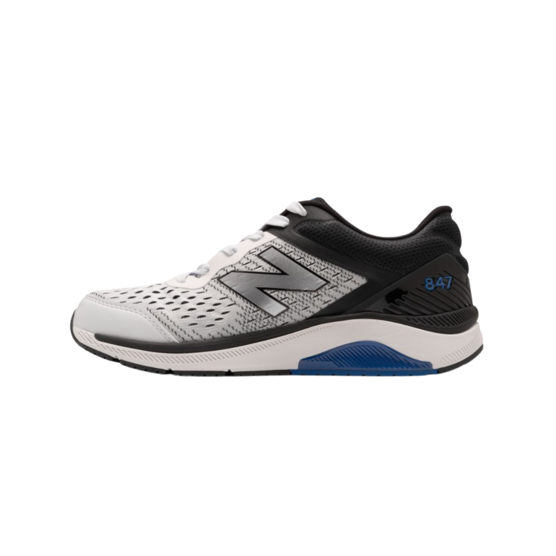 Side View of Men’s New Balance 847v4 in Arctic Fox Black Team Royal – featuring reinforced synthetic overlays for support, lightweight midsole cushioning to reduce impact, and sleek athletic design.