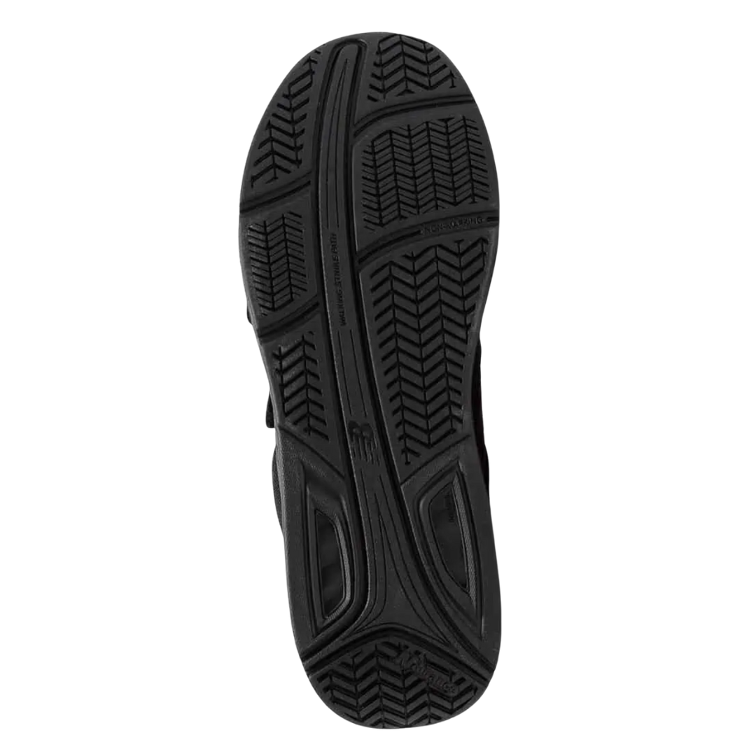 Bottom View of Men’s New Balance 928v3 Hook and Loop walking shoe in black – featuring slip-resistant rubber outsole, forefoot flex grooves, and stabilizing tread pattern for secure footing.