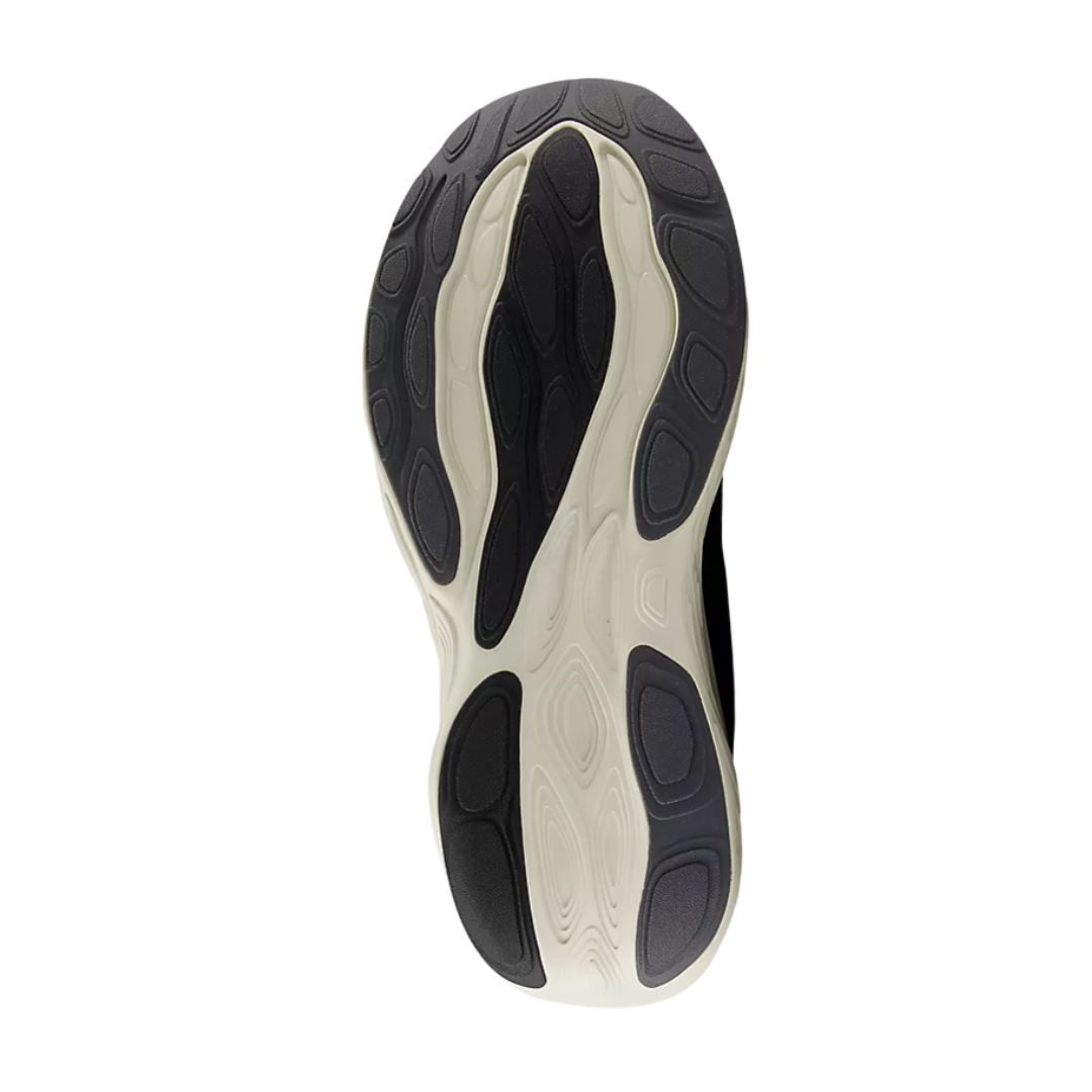Bottom view of Men’s New Balance Fresh Foam X 1080v14 running shoe in black/magnet/linen – featuring a full-length rubber outsole with strategic flex zones, data-driven traction mapping, and durable heel-to-toe transition support.