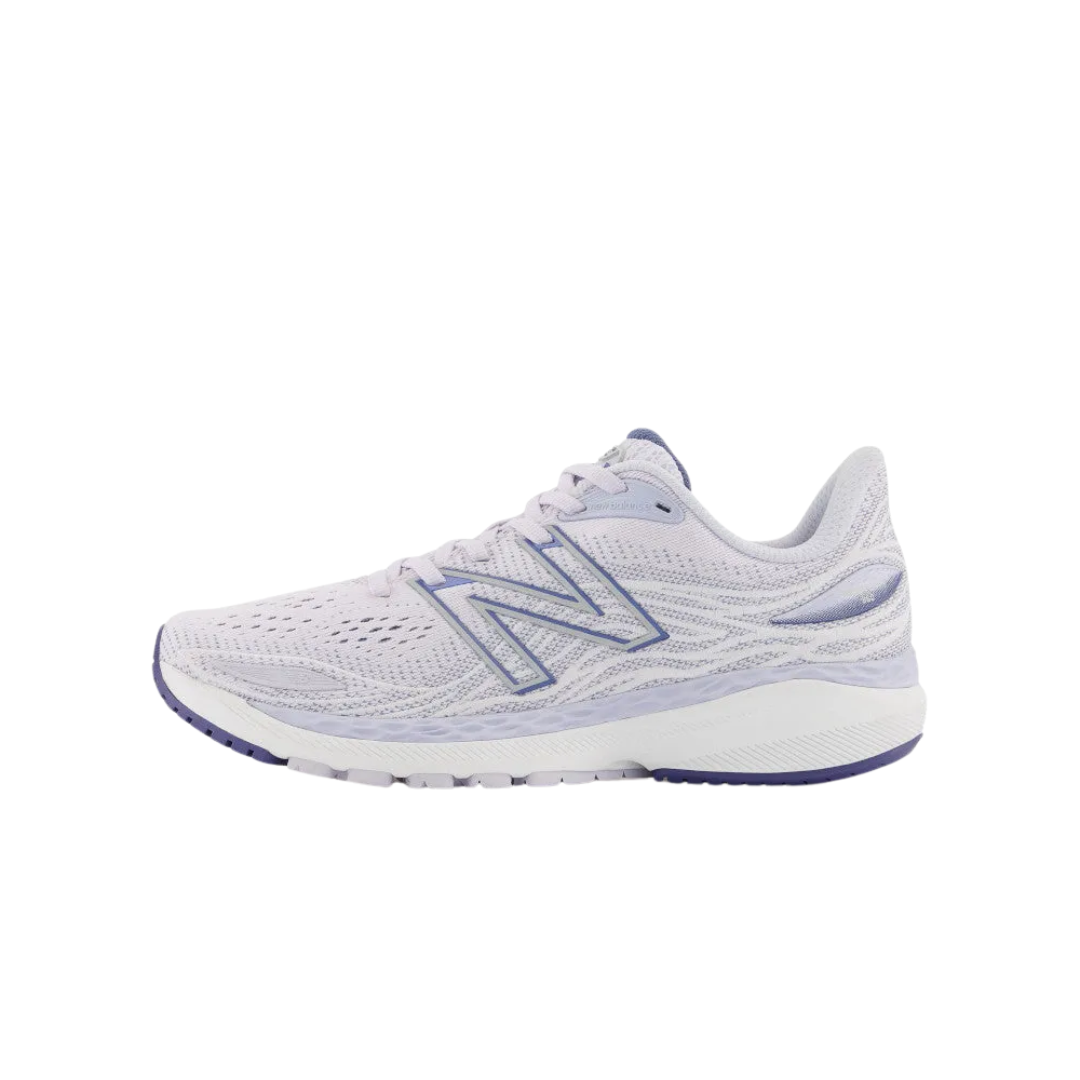 Side view of Women’s New Balance Fresh Foam X 860v12 in White – featuring dual-density medial post for stability, Fresh Foam X midsole cushioning for responsive comfort, and a sleek design for modern aesthetics.