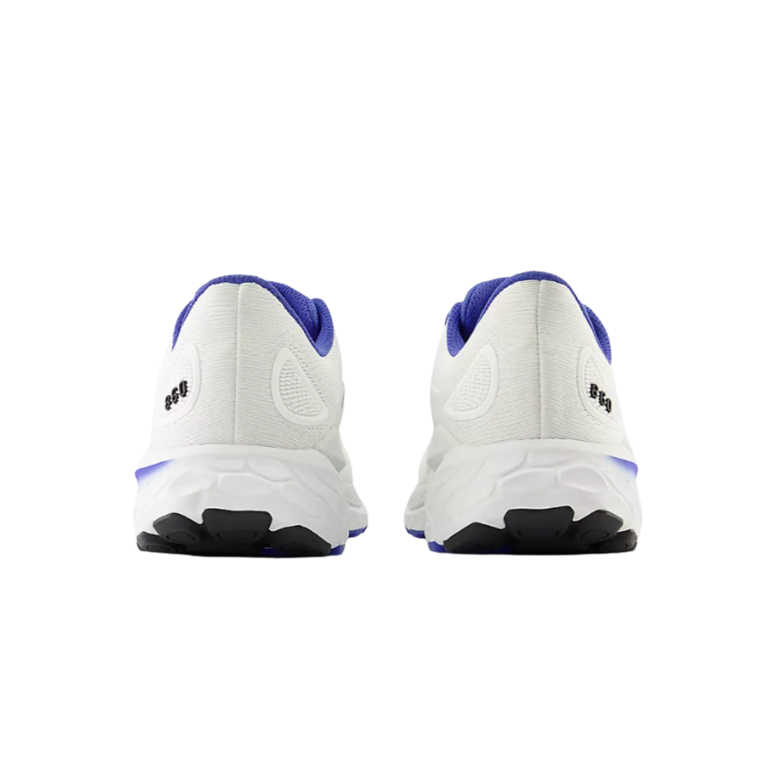 Back View of Men’s New Balance Fresh Foam X 860v13 running shoe in white with marine blue – featuring padded heel collar, pull tab for easy wear, and reflective detailing for low-light visibility.