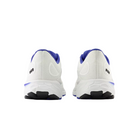 Back View of Men’s New Balance Fresh Foam X 860v13 running shoe in white with marine blue – featuring padded heel collar, pull tab for easy wear, and reflective detailing for low-light visibility.