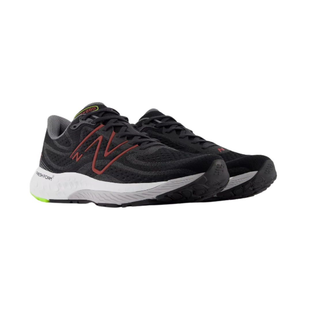 Side view of Men’s New Balance Fresh Foam X 880v13 running shoe in Black and Brick Red – featuring supportive overlays, lightweight design, and cushioned midsole for comfort.