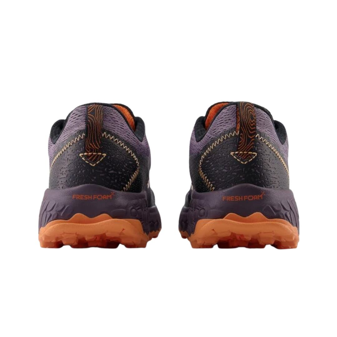 Back view of Women’s New Balance Fresh Foam X Hierro v7 in Shadow with Black – featuring a durable Vibram® Megagrip rubber outsole with strategic tread patterns for reliable traction on various surfaces.