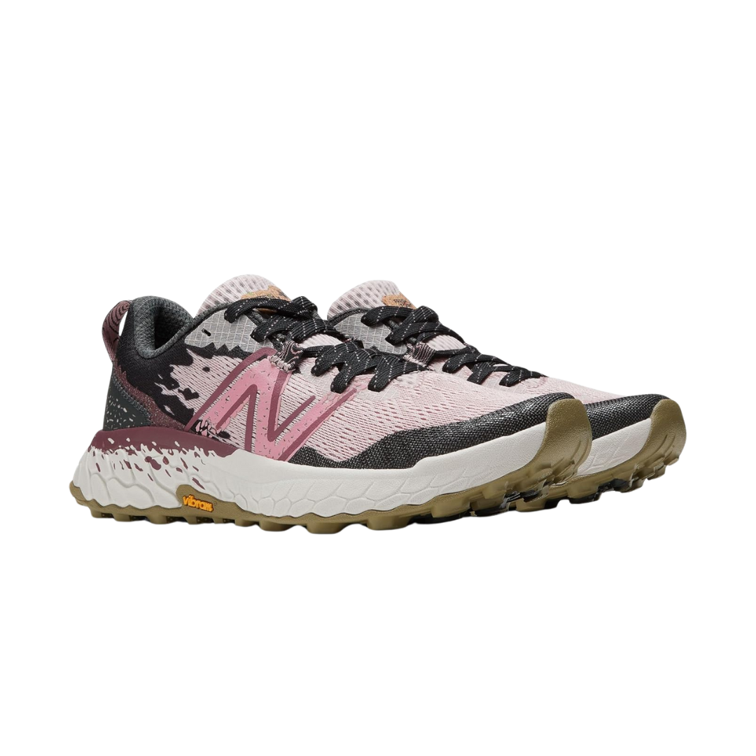Side view of Women’s New Balance Fresh Foam X Hierro v7 in Stone Pink/Blacktop/Washed Burgundy – featuring Fresh Foam X midsole cushioning, Vibram® Megagrip outsole, and sleek design lines for a modern aesthetic.