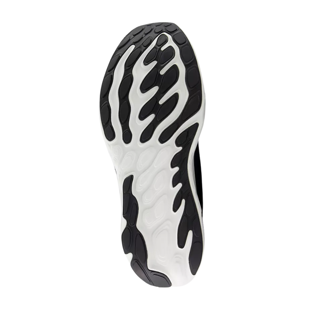 Bottom view of Men’s New Balance Fresh Foam X Vongo v6 running shoe in Black and White – featuring a durable rubber outsole with multi-directional traction for stability.