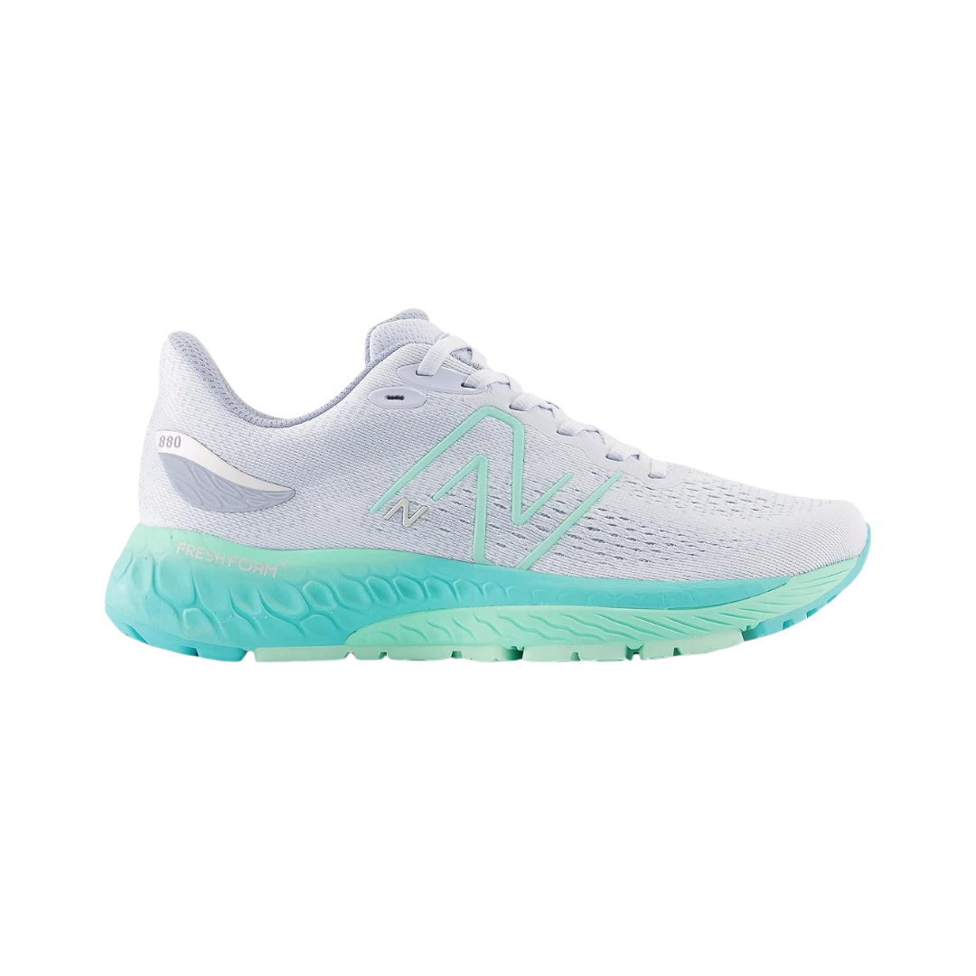 Side view of Women’s New Balance Fresh Foam X 880v12 in Starlight/Bright Mint/Cyber Jade – featuring lightweight construction, supportive cushioning, and durable outsole suitable for running activities.
