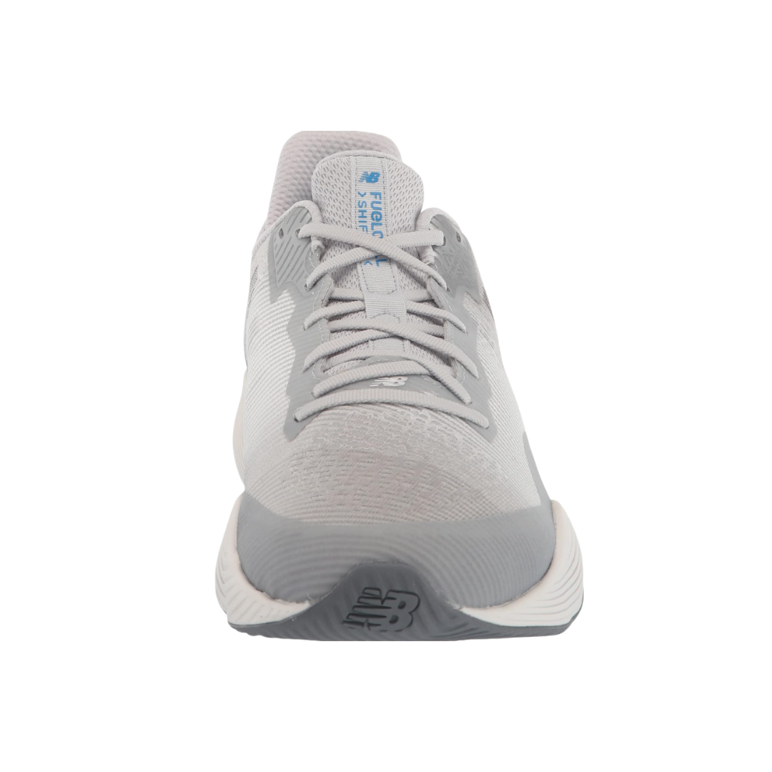 Front View of Men’s New Balance FuelCell Shift TR training shoe in steel with white and serene blue – featuring roomy toe box, seamless upper design, and secure lace closure for a snug fit.