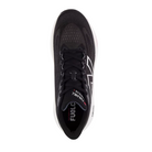 Top View of Men’s New Balance FuelCell Walker Elite walking shoe in black with team red and silver – featuring engineered mesh upper, padded tongue, and cushioned collar for comfort.