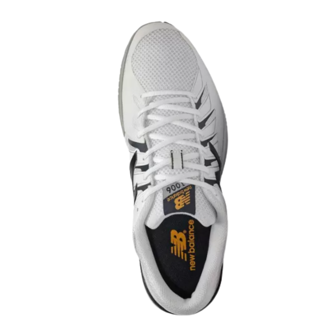 Top View of Men’s New Balance Court 1006 sneaker in white with navy – featuring premium smooth leather upper for durability and easy cleaning, padded tongue with breathable mesh lining, and cushioned collar for ankle support and comfort.