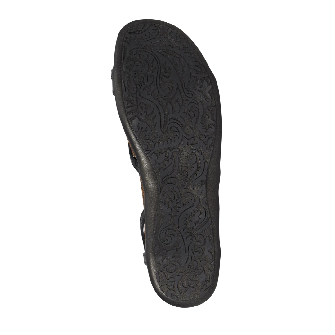 Bottom view of Women’s Noat Dorith sandal in black raven leather – featuring a durable rubber outsole for traction, slight heel lift for ergonomic comfort, and textured grip zones for slip resistance.