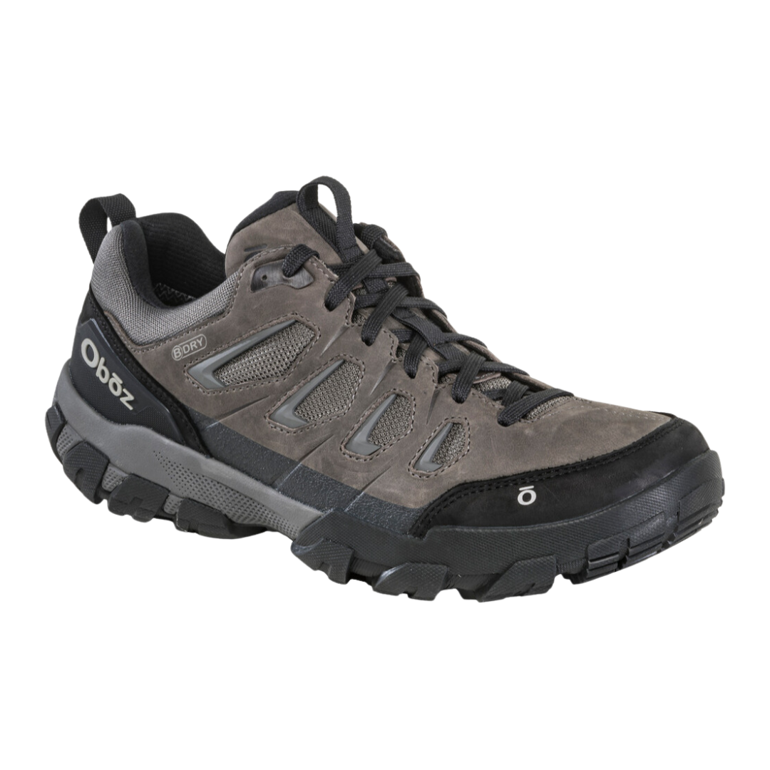 Angled view of Men's Sawtooth X Low B-Dry hiking shoe in Charcoal – featuring a combination of waterproof nubuck leather and mesh upper, B-Dry waterproofing, cushioned midsole, and high-traction outsole for dependable performance in changing trail conditions.