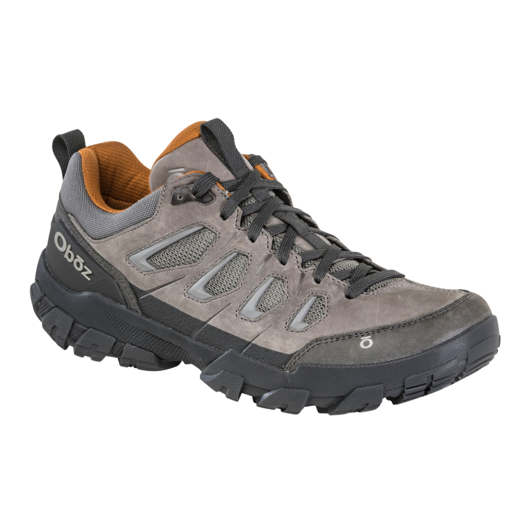 Angled view of Men's Sawtooth X Low hiking shoe in Hazy Gray – featuring a trail-ready blend of nubuck leather and mesh upper, responsive midsole cushioning, and a durable outsole for versatile outdoor performance.