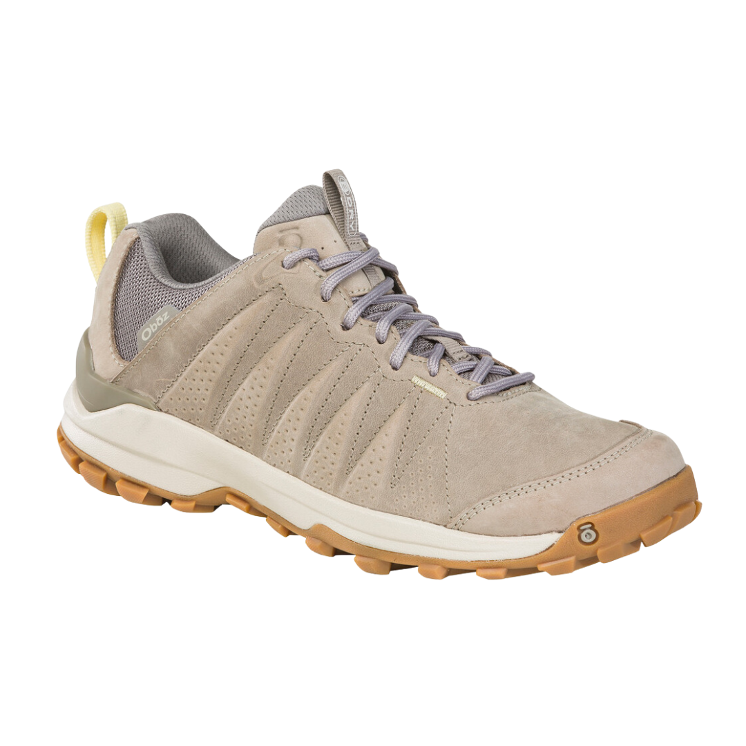 Angled view of Women’s Oboz Sypes Low B-DRY in Gravel – featuring waterproof leather construction, breathable mesh, O FIT insole for all-day support, and a rugged yet casual design suited for trail and everyday wear.
