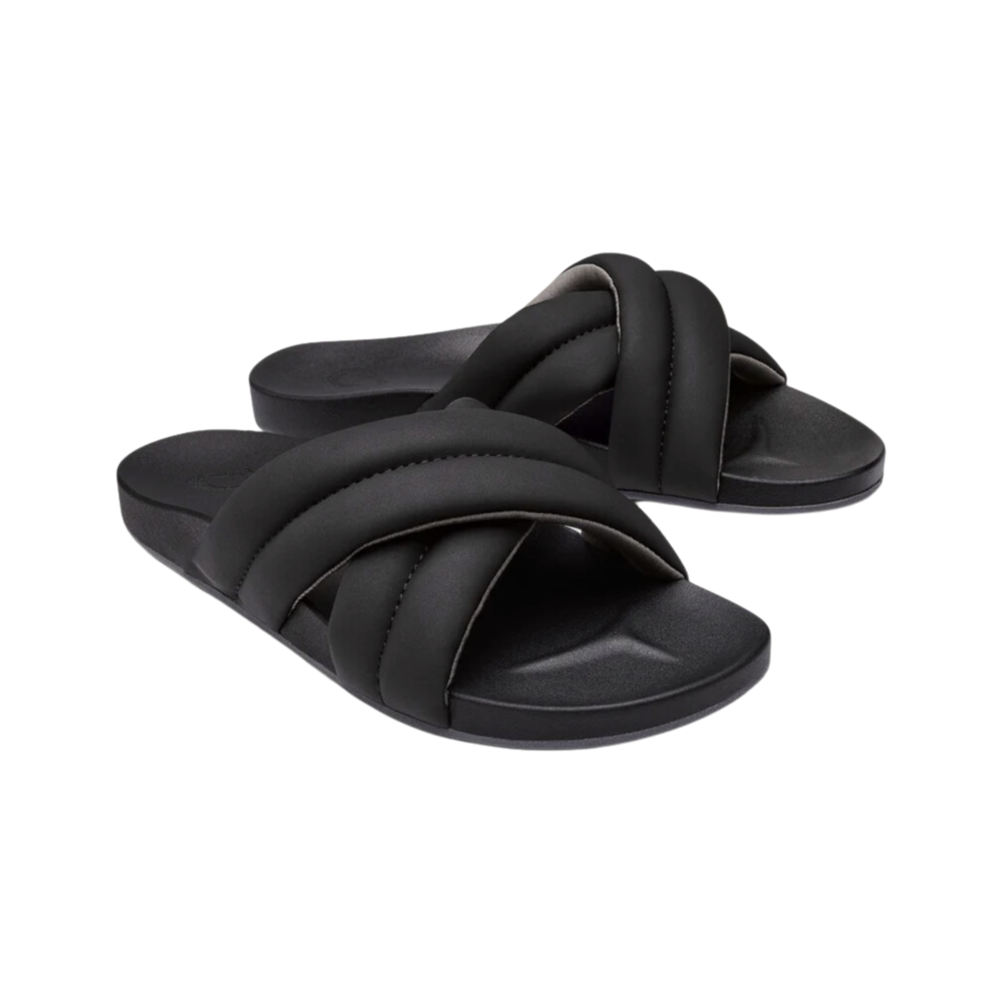 Angled view of Women’s Olukai Hila sandal in black – features include a water-friendly synthetic strap, plush cushioned footbed with arch support, slim and stylish profile, and a textured outsole for added stability.