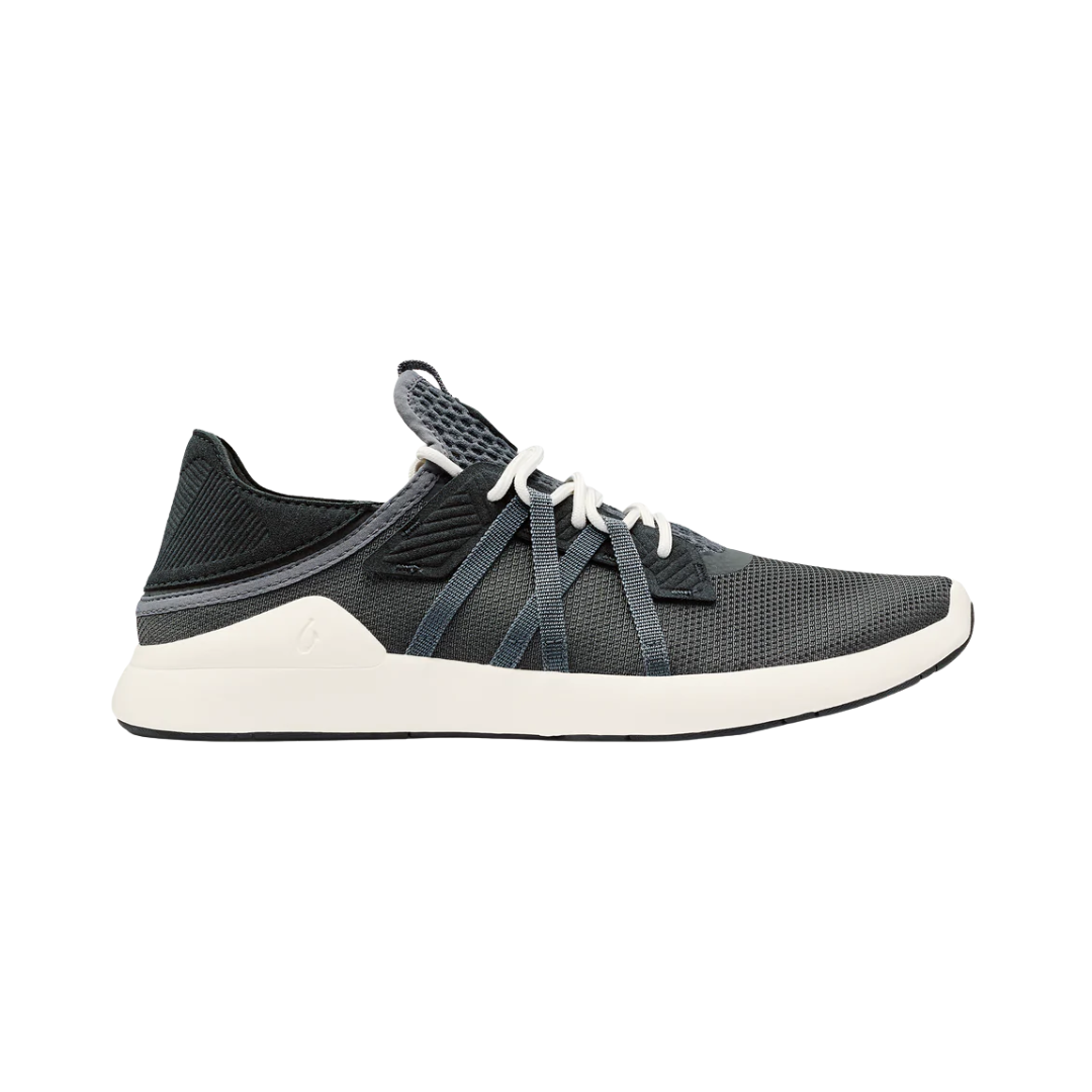 Side view of Men’s Olukai Holo sneaker in dark shadow – made with breathable mesh, cushioned EVA midsole, and lightweight non-marking outsole for all-day wear.