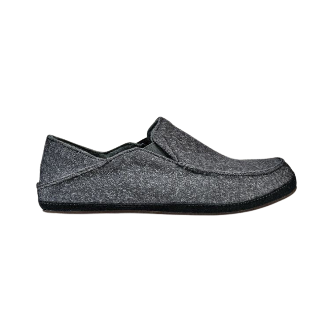 Side view of Men’s Olukai Moloa Hulu slip-on in dark shadow – featuring premium nubuck leather, shearling lining for warmth, and non-marking rubber outsole with traction pods.